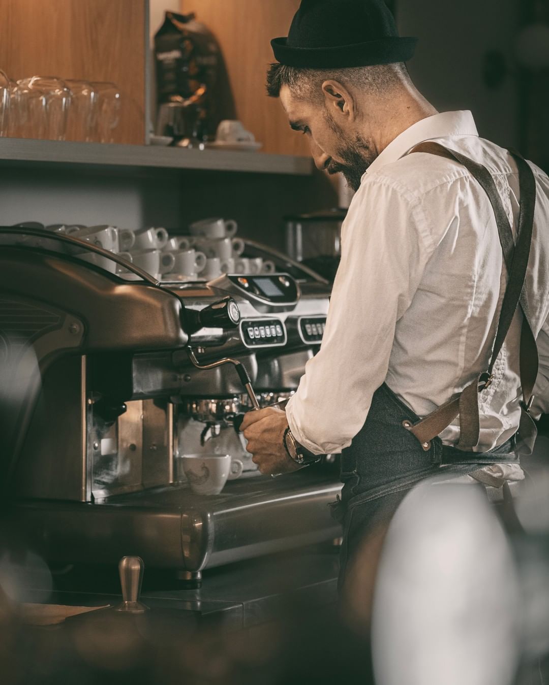 A man working at a coffee shop